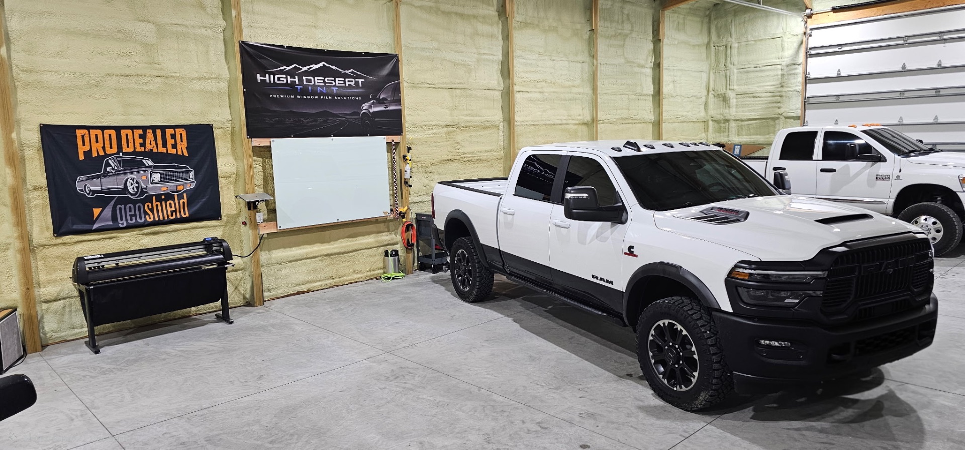 White Ram 2500 Power Wagon parked inside the High Desert Tint bay after a tint install